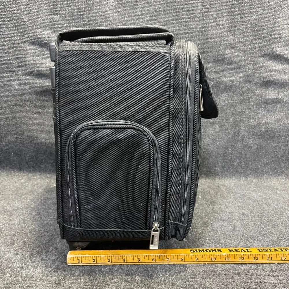 US Luggage New York Black Ballistic Nylon Rolling Catalog Case Wheeled Briefcase